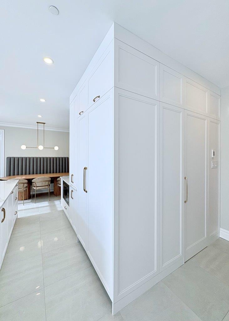 Contemporary living area with open layout and wood floors