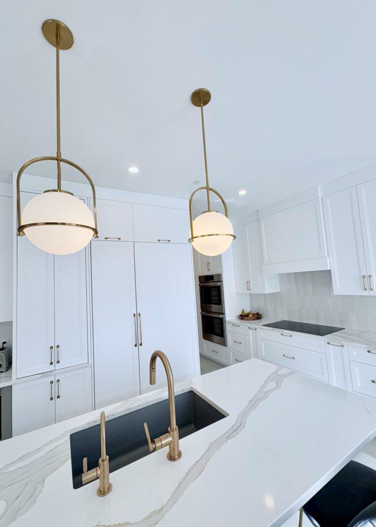Contemporary living area with open layout and wood floors