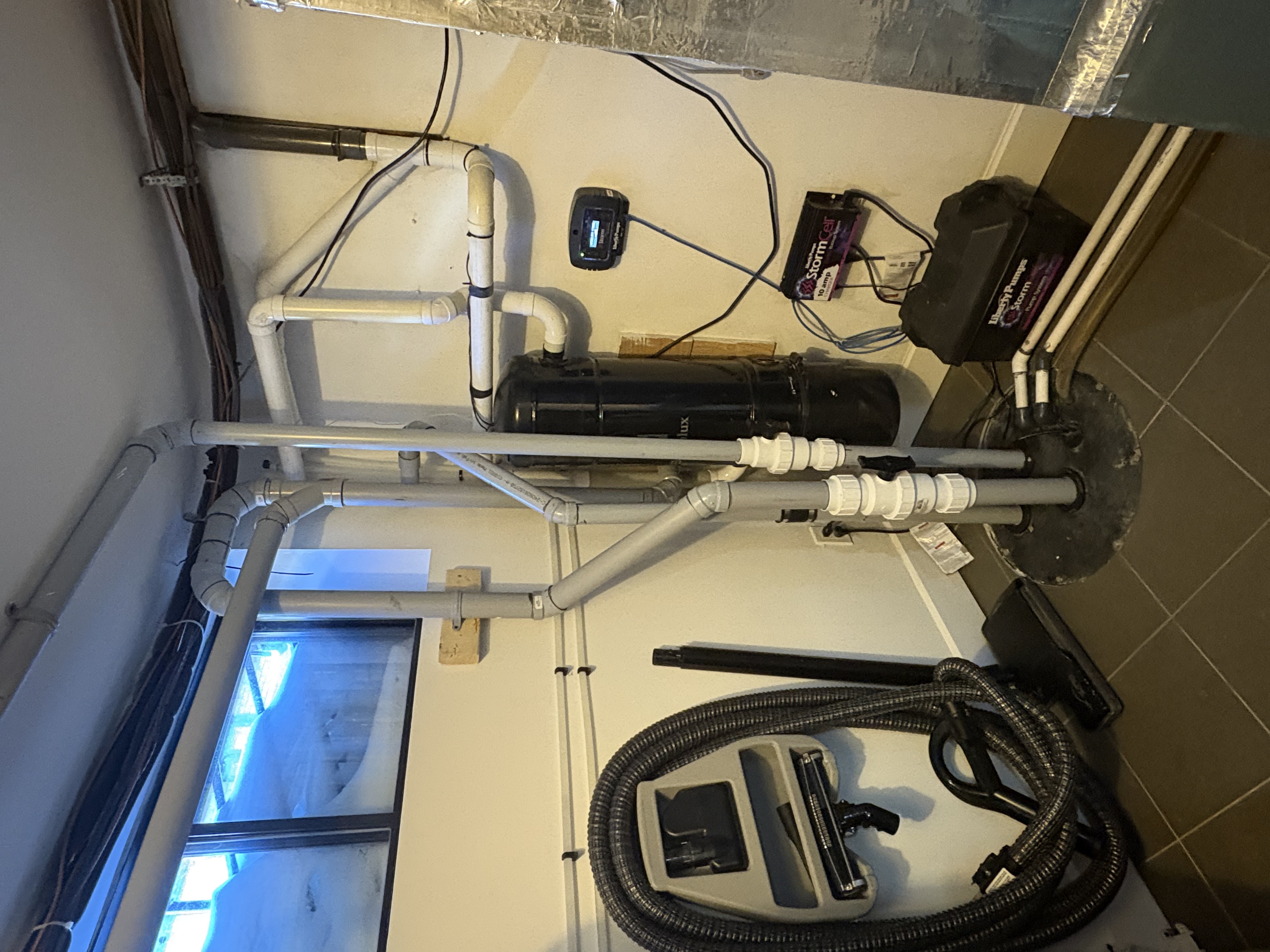 Contemporary living area with open layout and wood floors