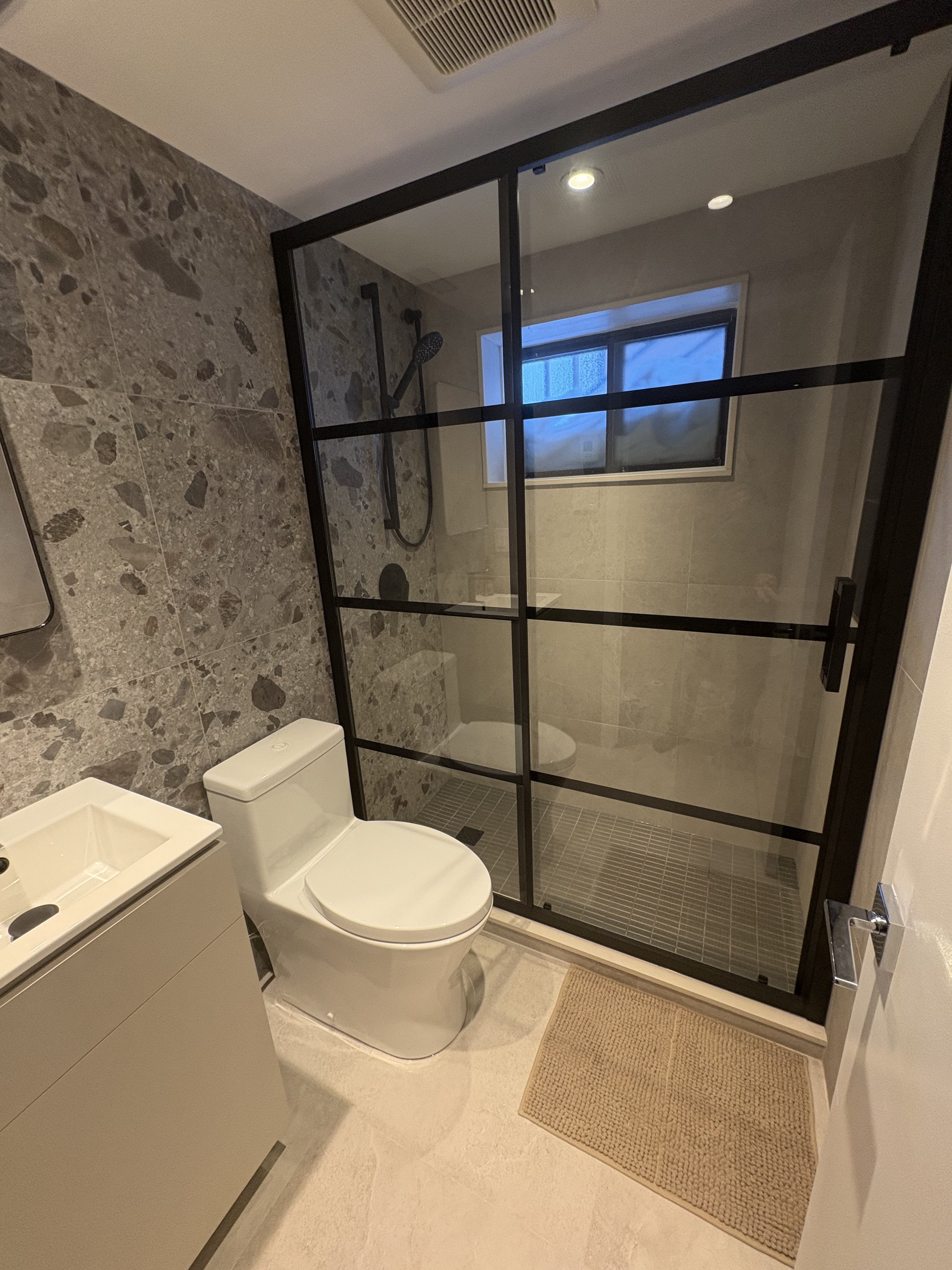 Skilled contractor measuring space for new install-min