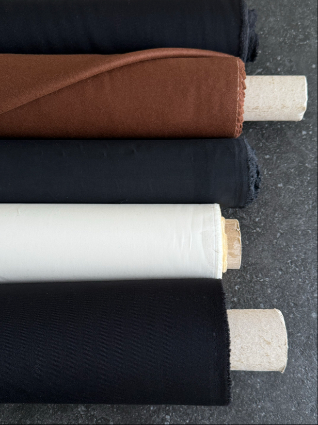 Selection of textiles sourced for NEEV made‑to‑order womenswear collection