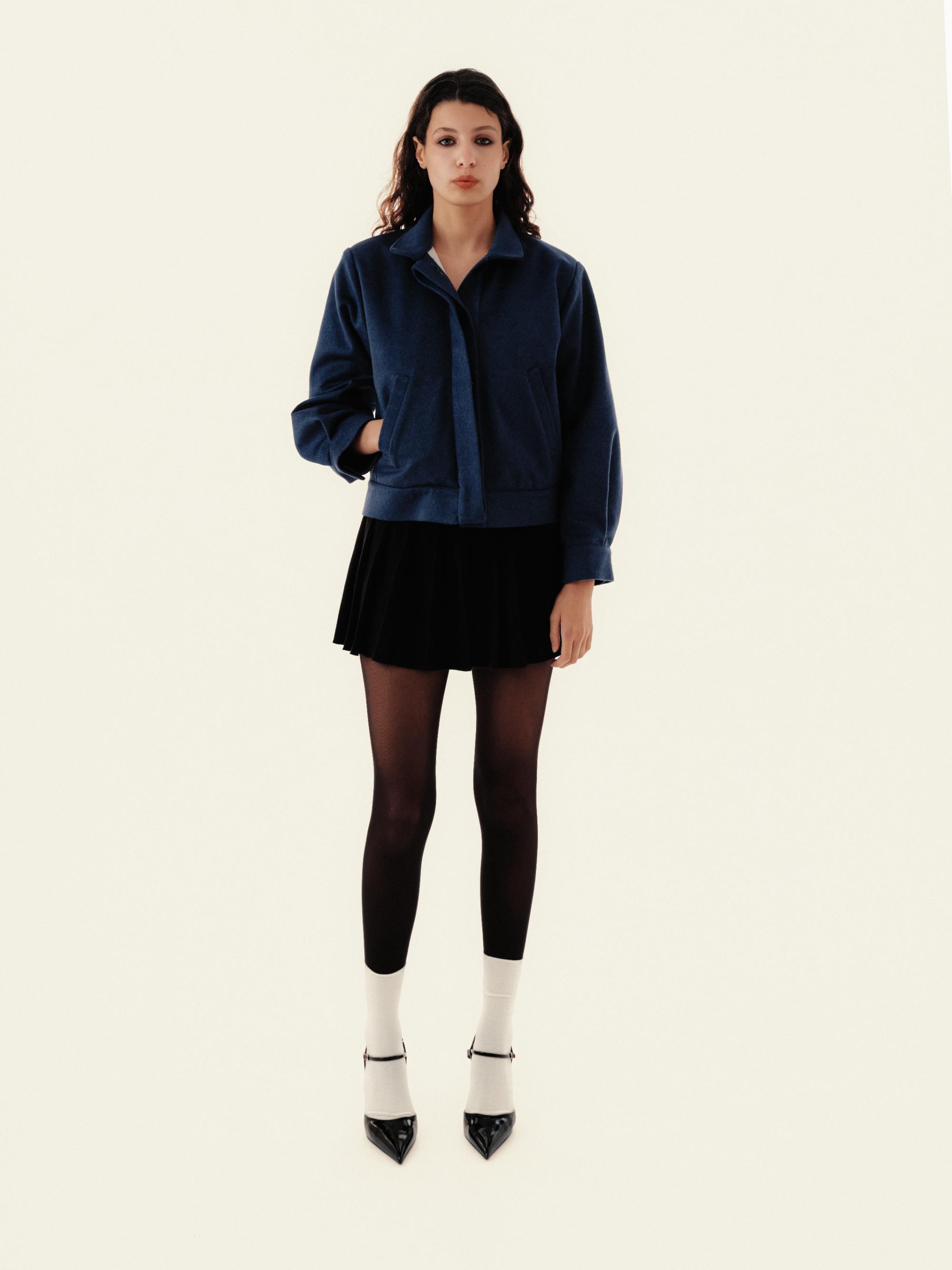 Full‑body view of the Ines Jacket in deep blue wool and cashmere blend
