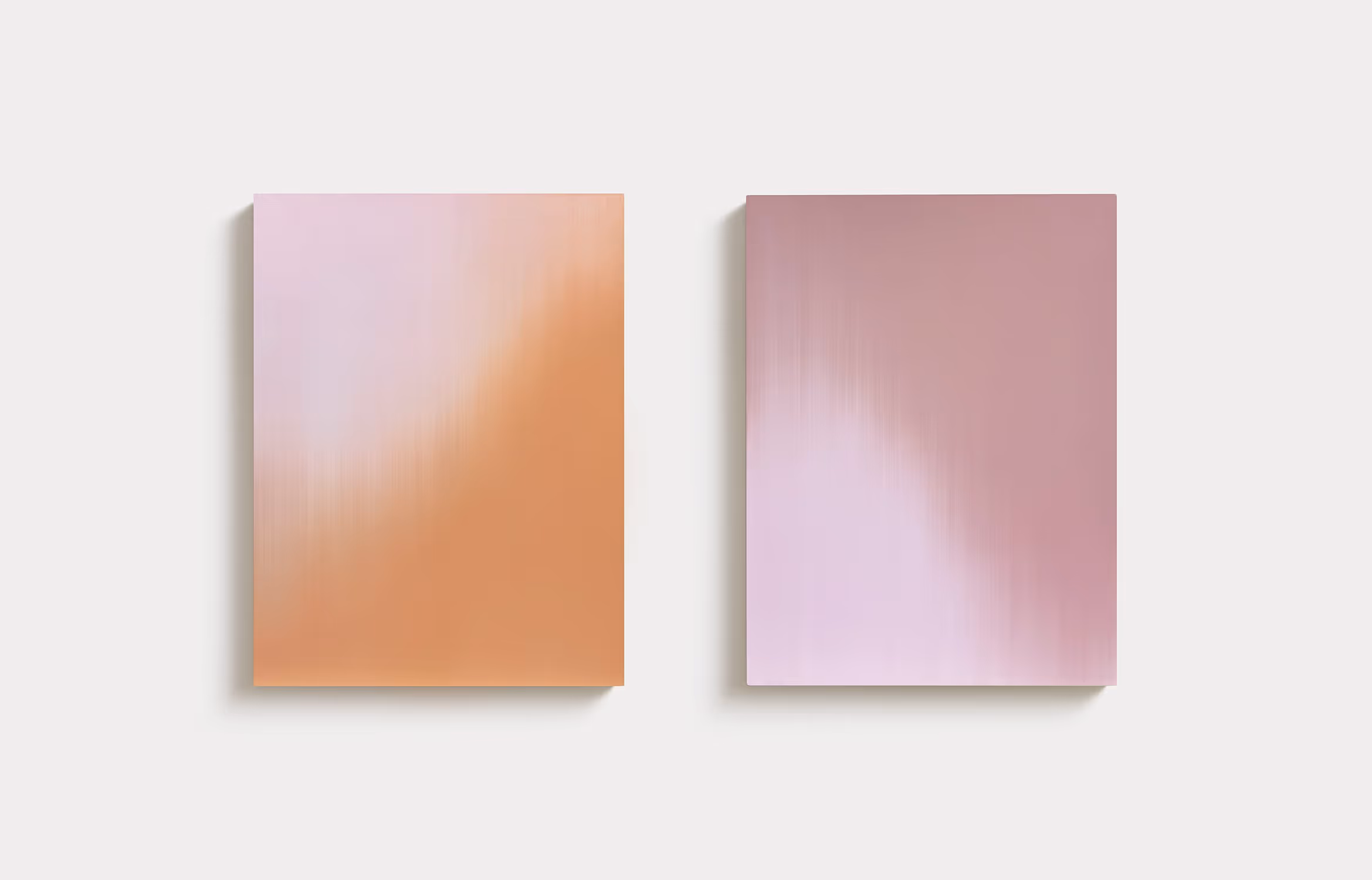 Two vertical rectangle gradient paintings; the left painting diagonally transitioning from light pink in the top left to orange in the bottom right; the right painting diagonally transitioning from light pink in the bottom left to dark pink in the top right