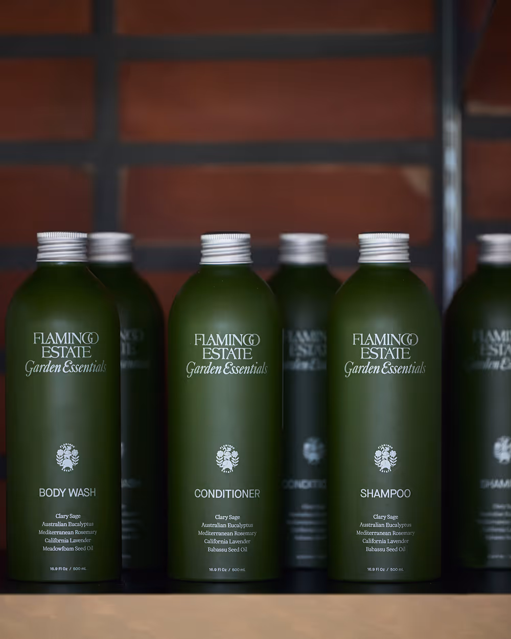 Flamingo Estate greens bottles of body wash, shampoo and conditioner