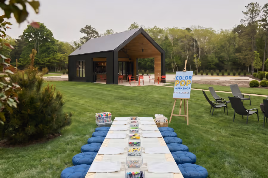 low table and cushions on grass set up for kids coloring