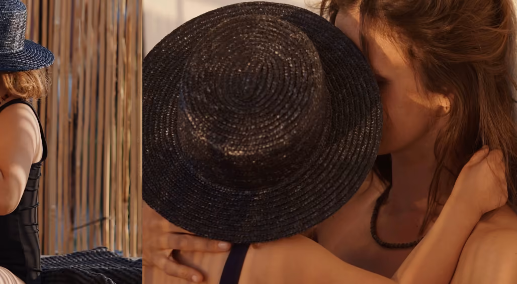 back of person wearing a hat