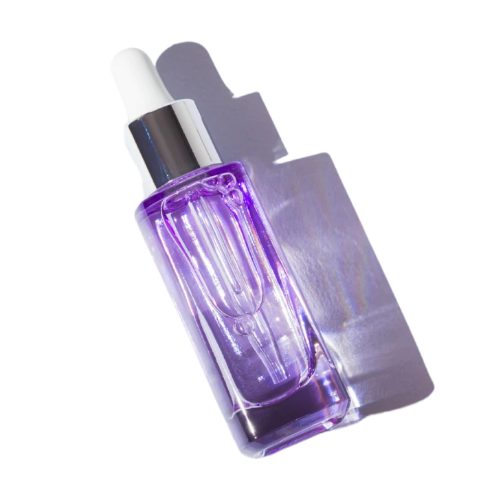 A glass bottle of hair product