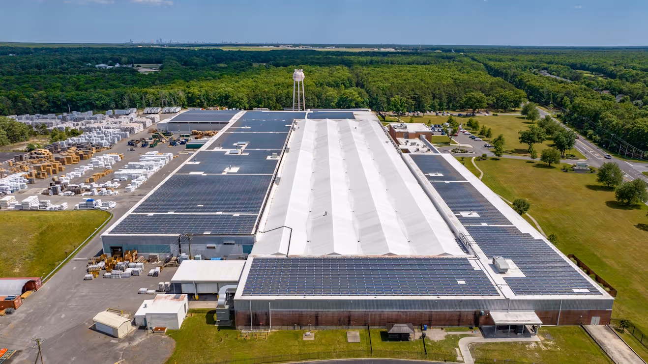 building with solar panels on top