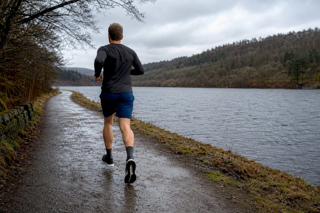 Runner on Damflask Reservoir path