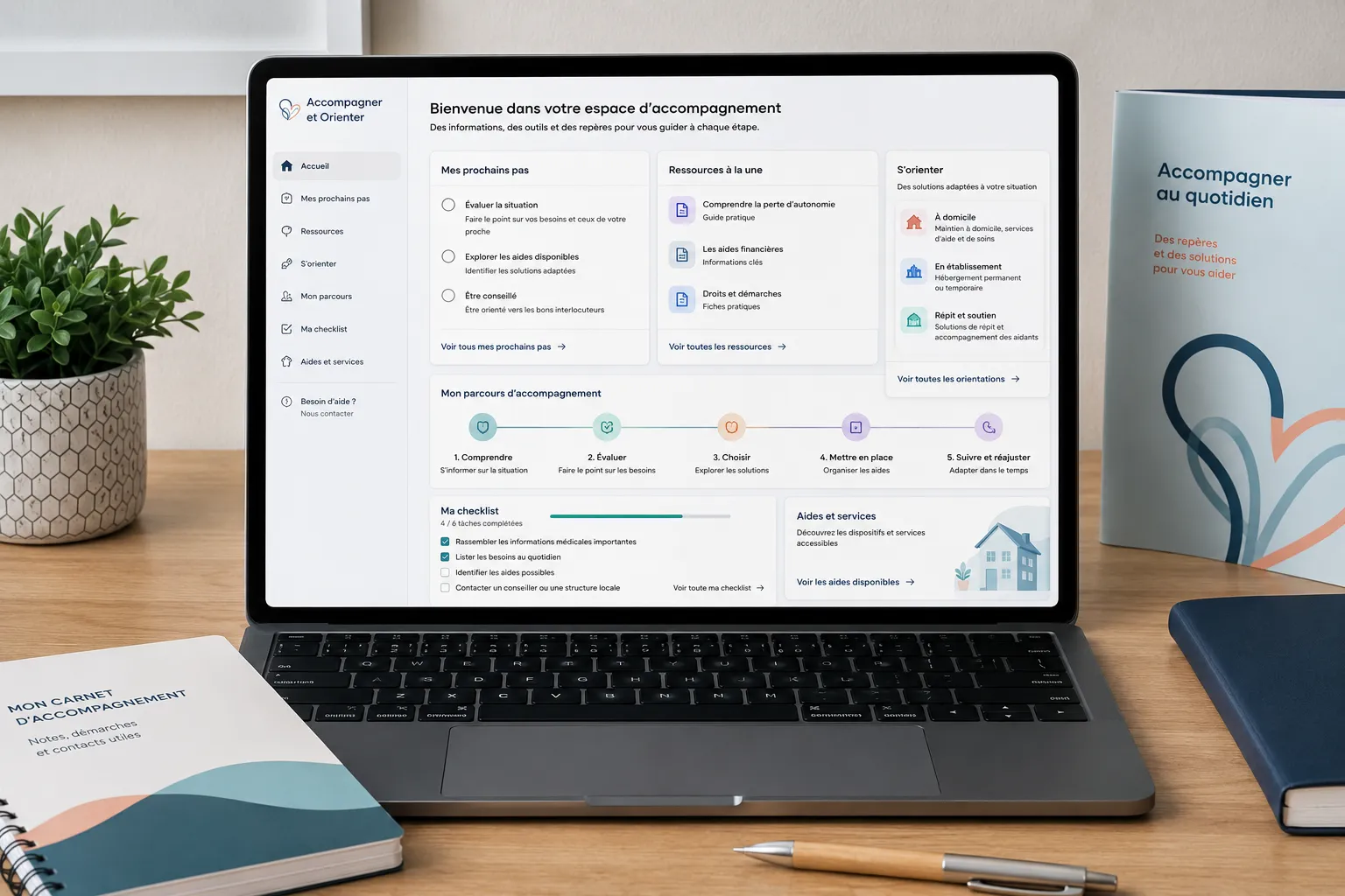 Ordinateur portable affichant un espace d'accompagnement avec étapes, ressources et checklist sur un bureau.