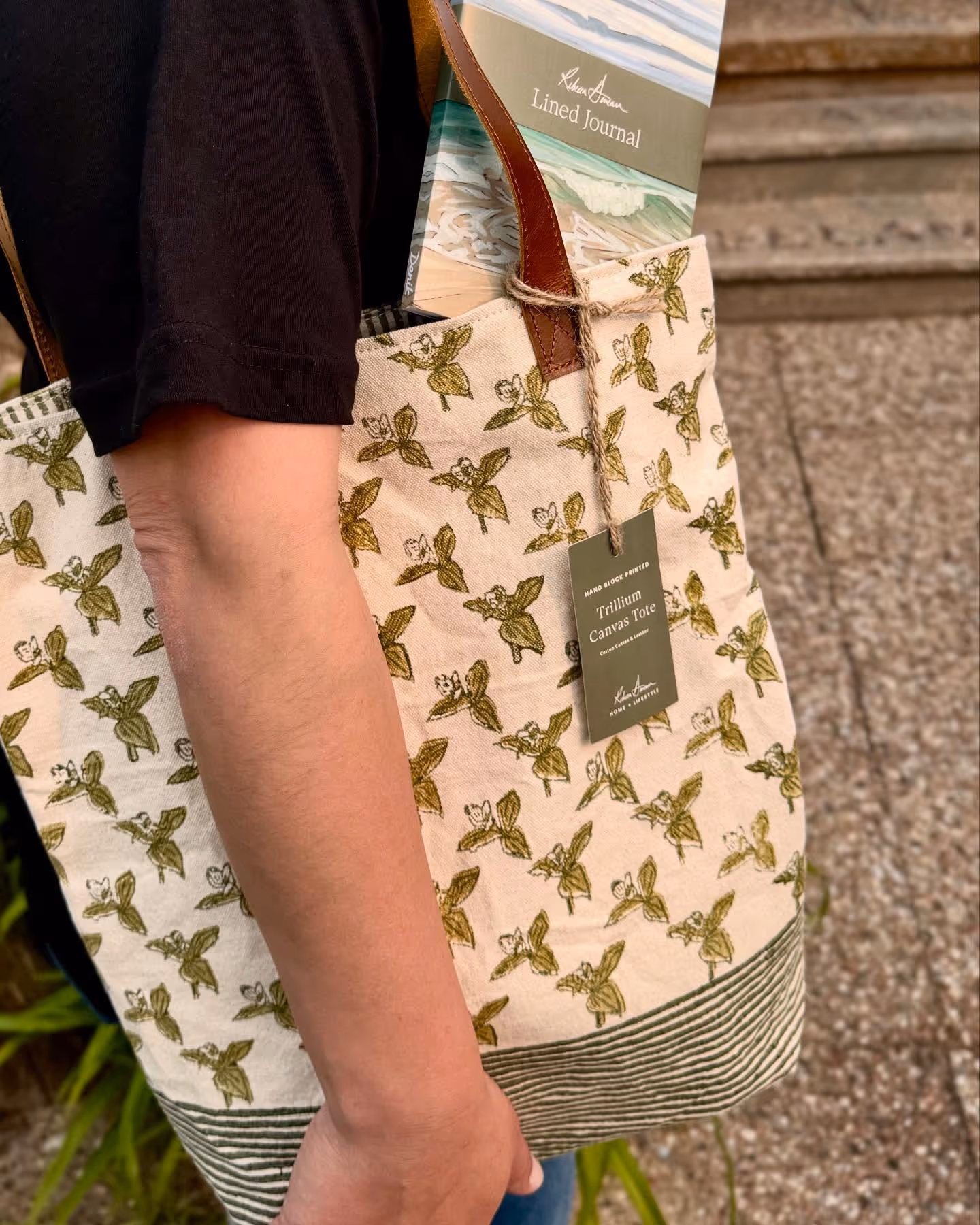 Trillium canvas tote with a book