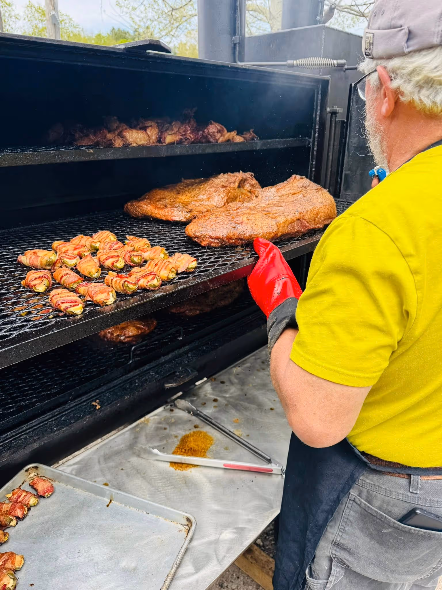 cooking stuffed jalapenos, brisket and chicken