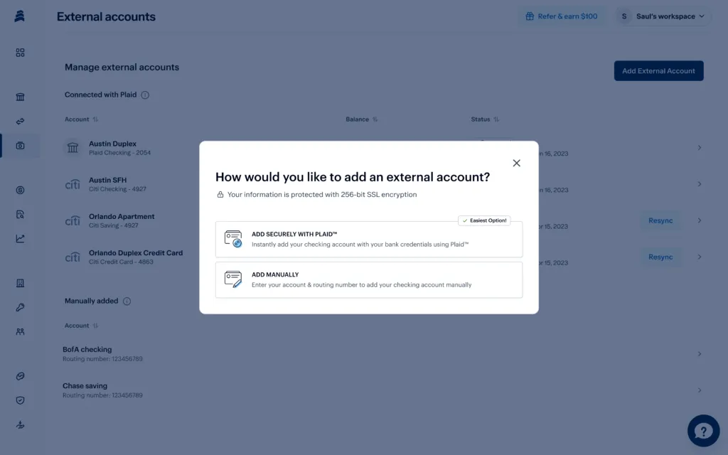 A pop-up window on a bank website asking how to add an external account with options: "Add securely with Plaid" and "Add manually," both with descriptions. The background shows a list of external accounts with icons and details.