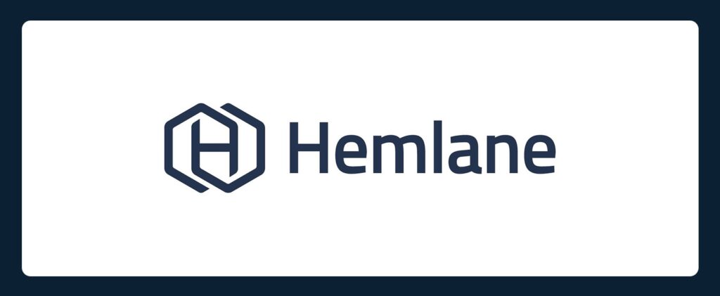 Hemlane logo featuring a stylized “H” inside a hexagon to the left of the word “Hemlane” in dark blue text on a white background, with a thick dark blue border.