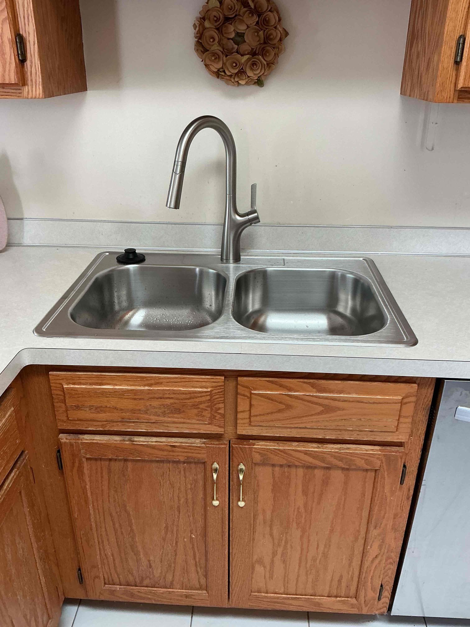 Refreshed kitchen with new sink and faucet in an Eagan MN home