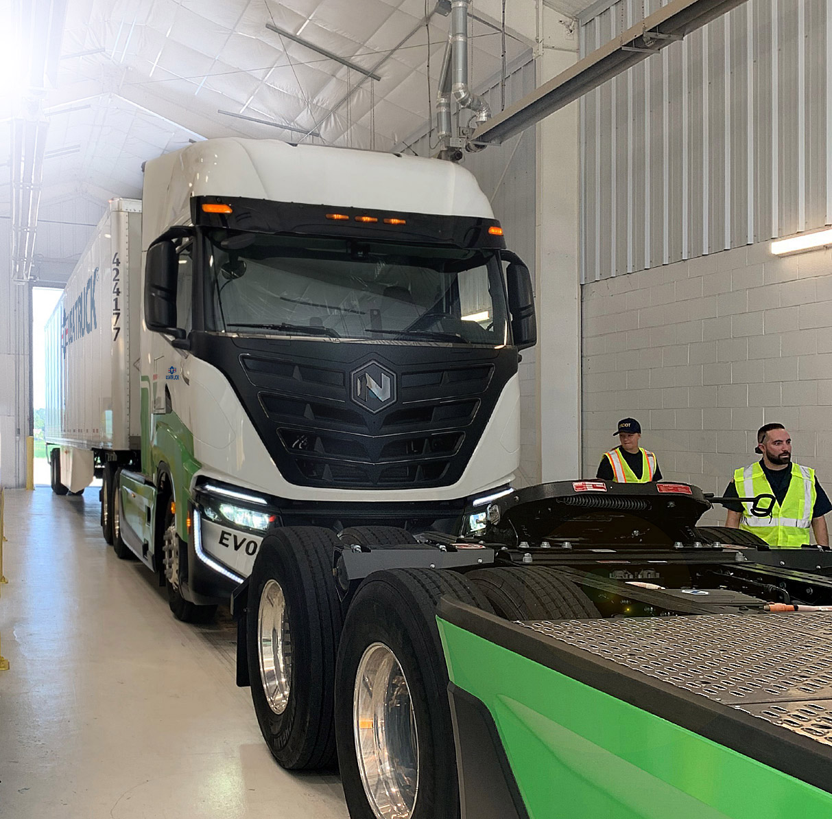 electric semi truck tractor in bay