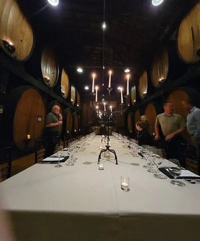 Interior of a wine cellar with oak barrels in Napa Valley, California