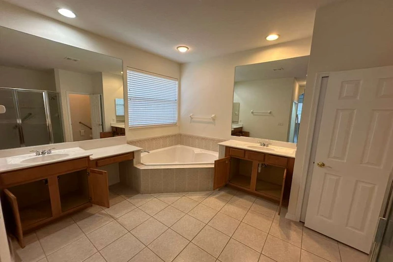 Bedroom before finish carpentry, with plain walls and missing trim details