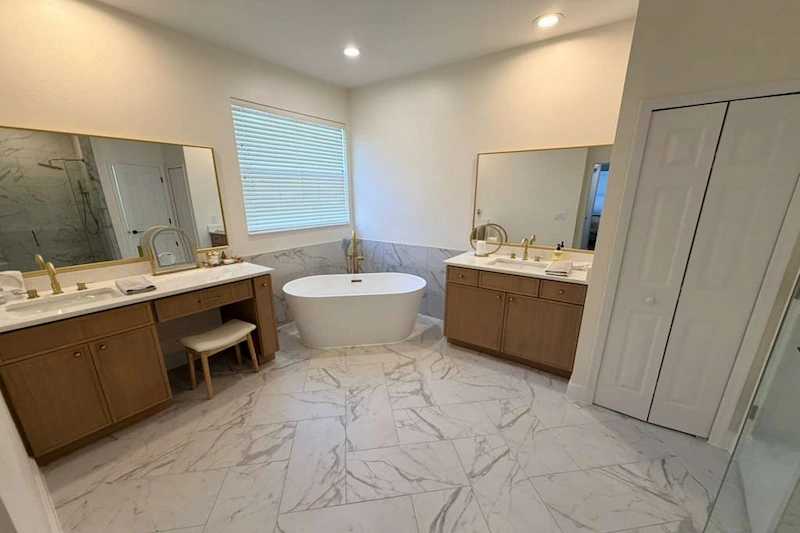 Bedroom before finish carpentry, with plain walls and missing trim details