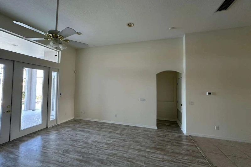 Bedroom before finish carpentry, with plain walls and missing trim details