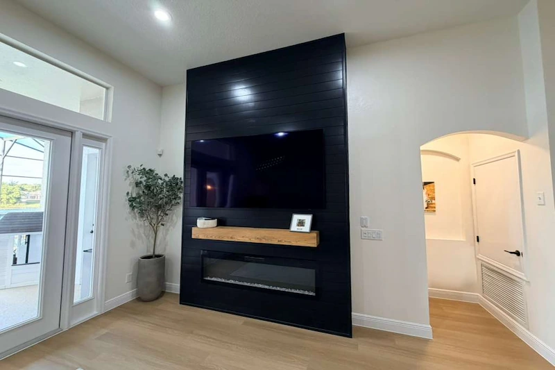 Bedroom before finish carpentry, with plain walls and missing trim details
