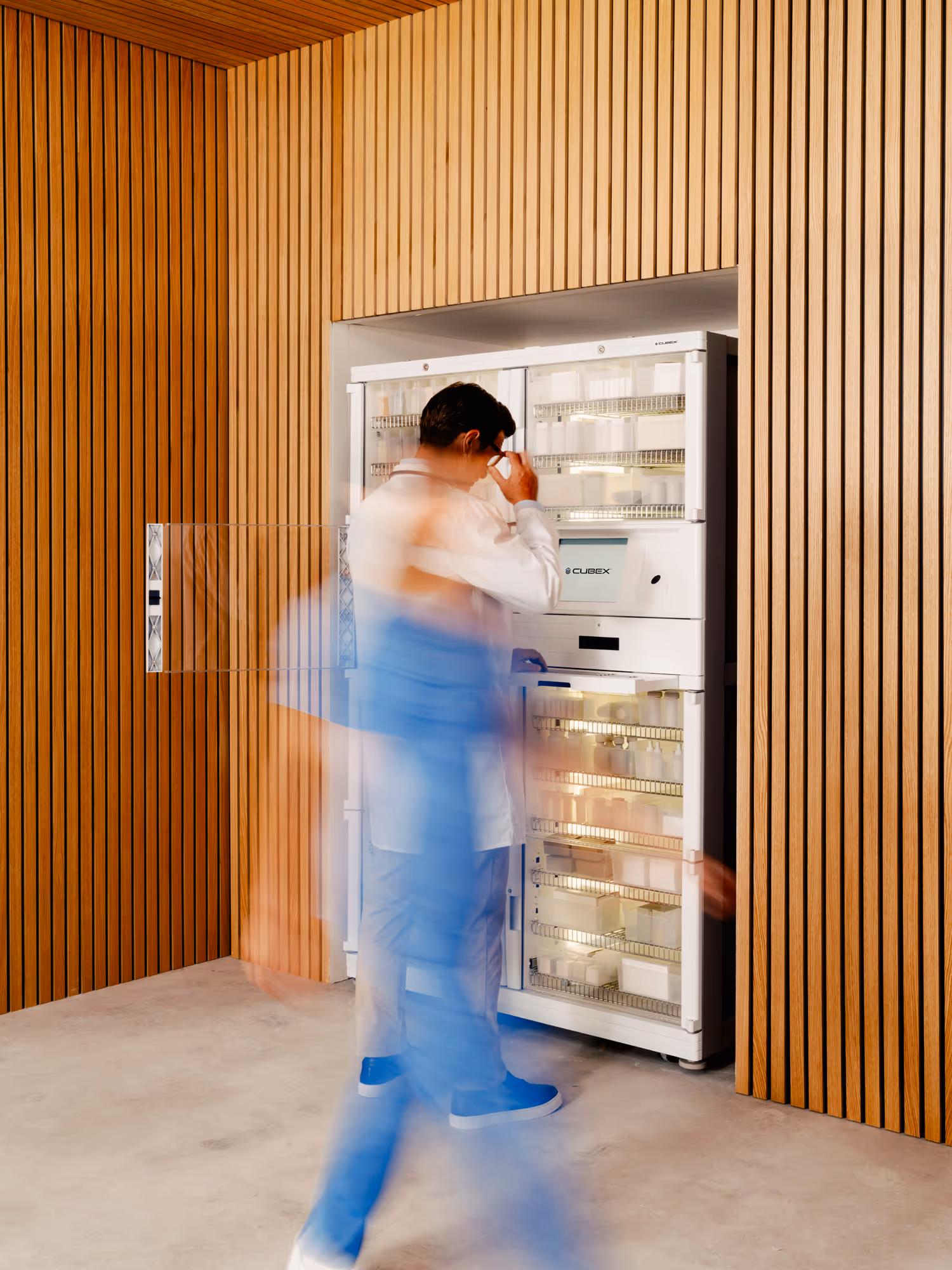 Image motion of doctor and assistant walking in the room