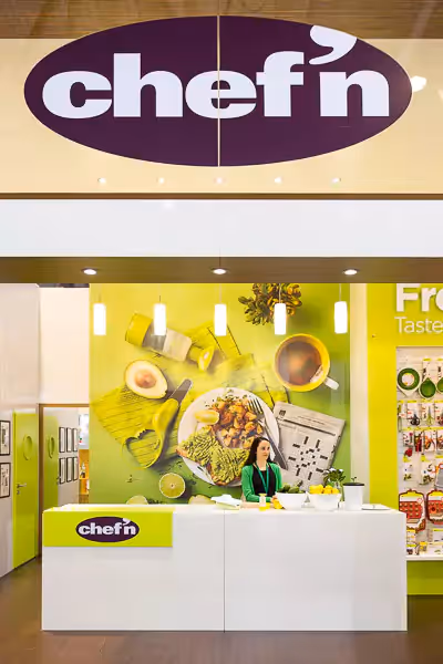 Chef'n tradeshow booth at Ambiente with larger-than-life printed lifestyle photography.