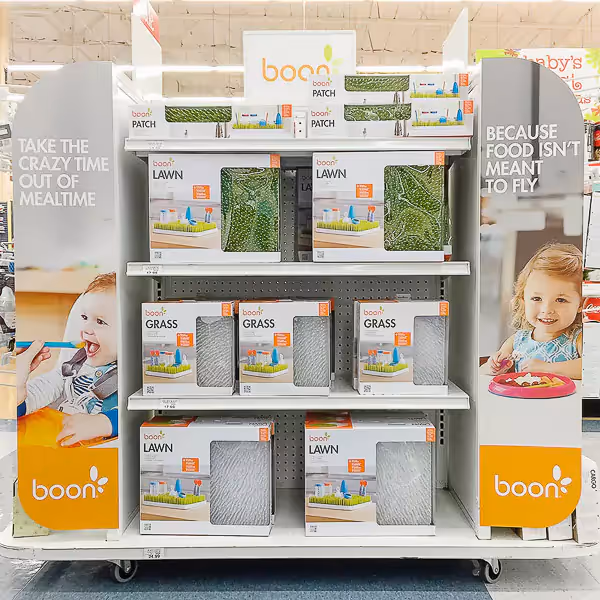 Retail display featuring product and lifestyle images.