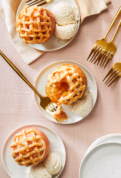 Baked apple with lattice pie crust topping food photography.