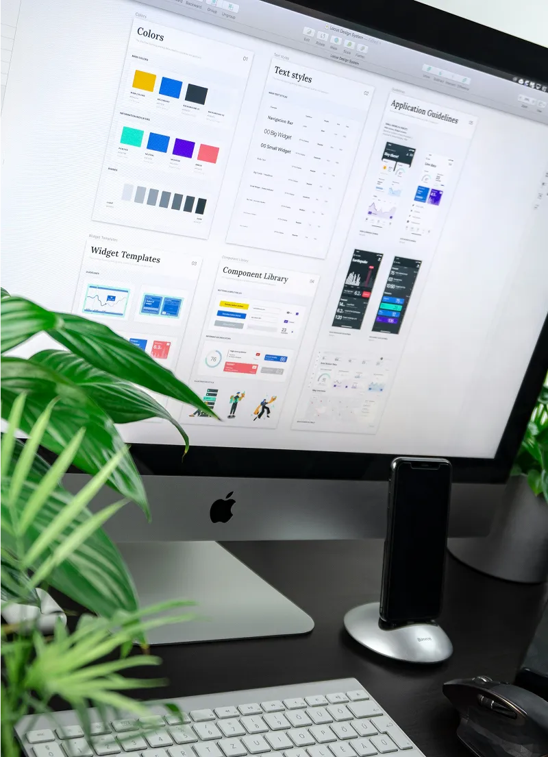 A computer monitor sitting on top of a desk.