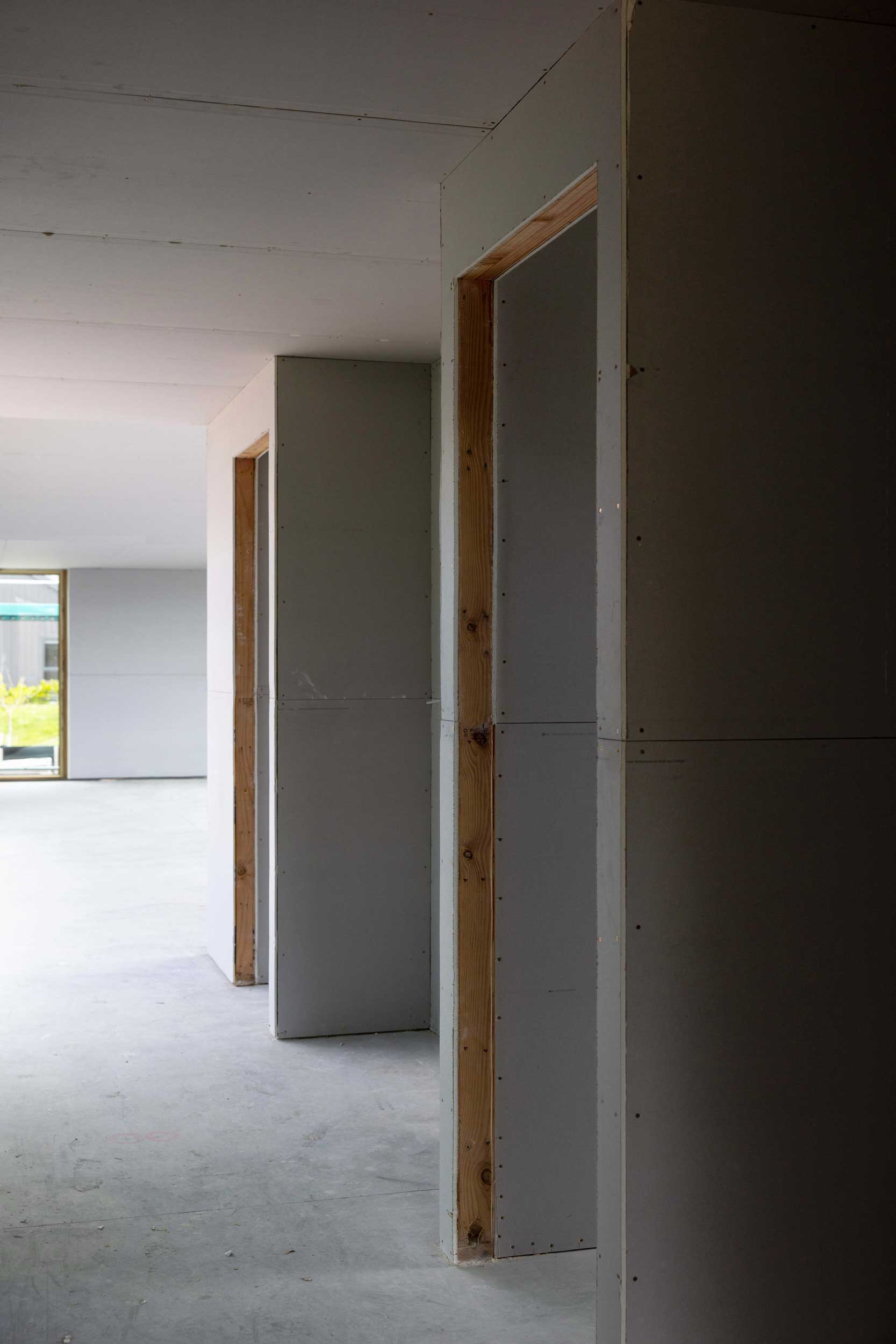 Sunlit passageway under construction at a new Architect designed home in Kinloch.