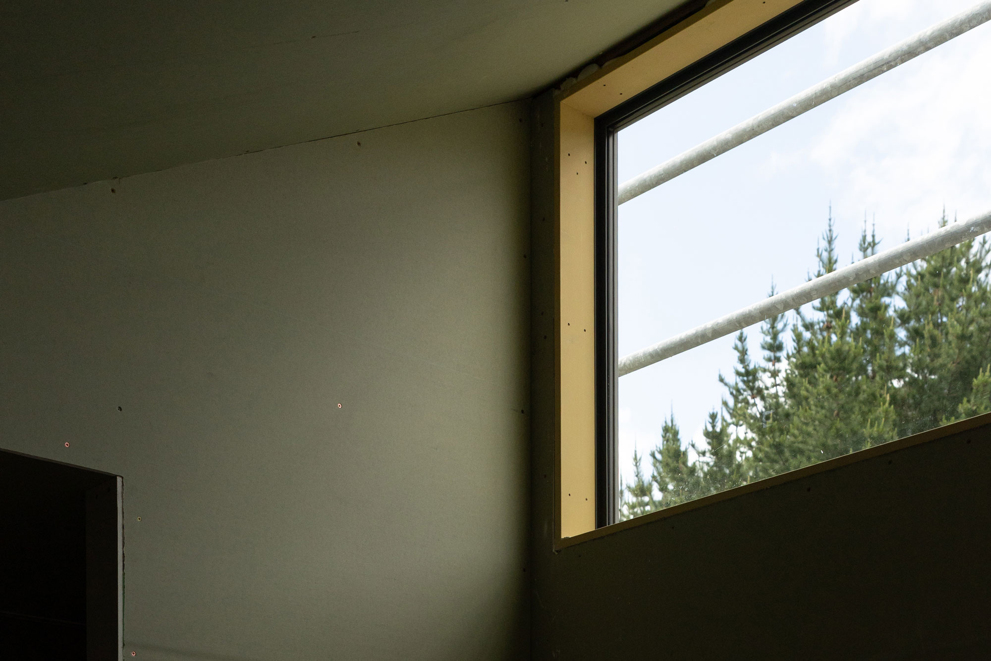 An eastern view through the bathroom window under construction in Kinloch. 