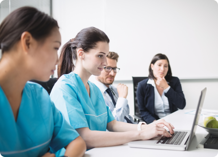 Revenue cycle team reviewing multiple policy updates from insurance payers