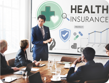 Hospital administration team meeting discussing payer denials rising