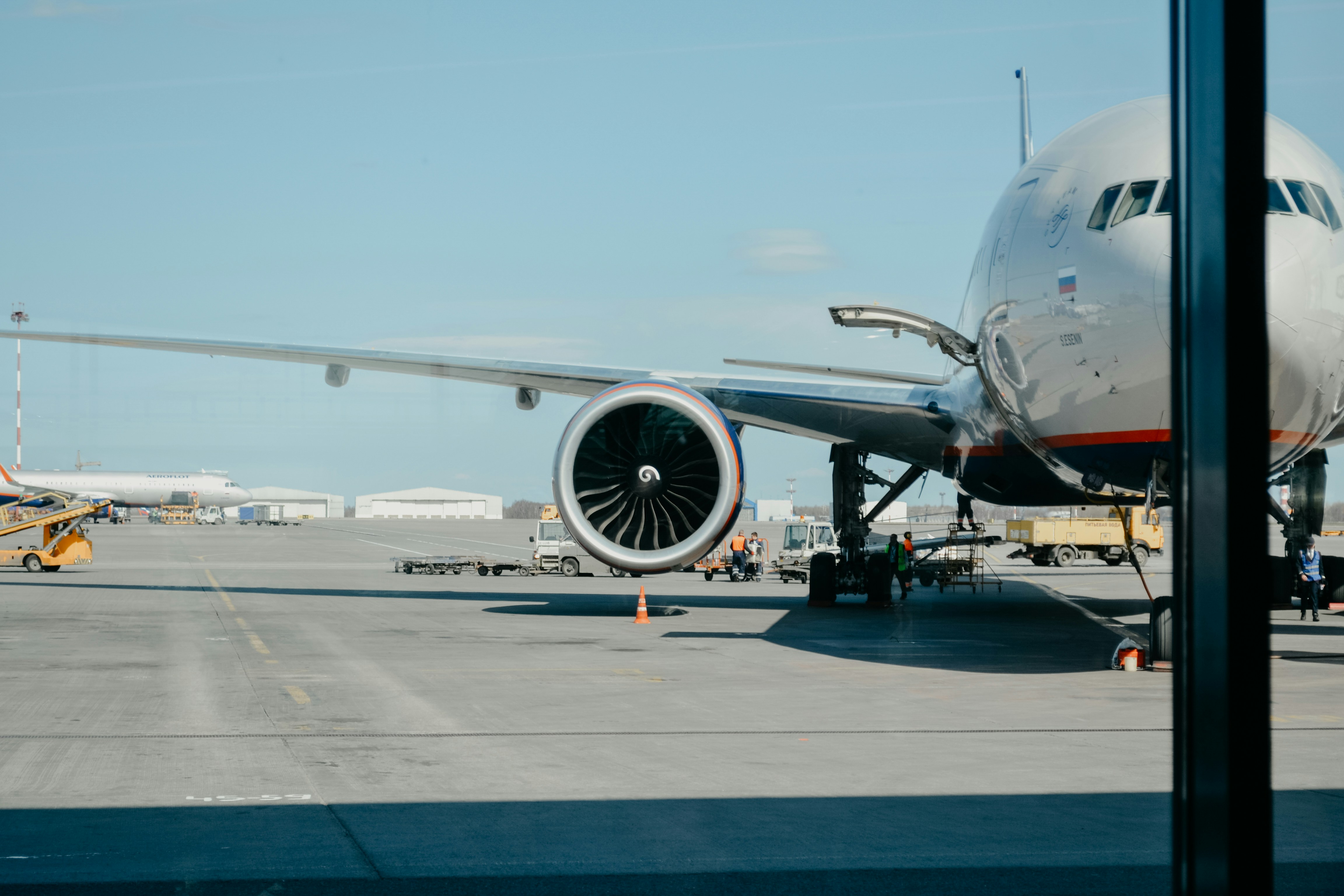 [background image] image of airport runway for an aviation service.