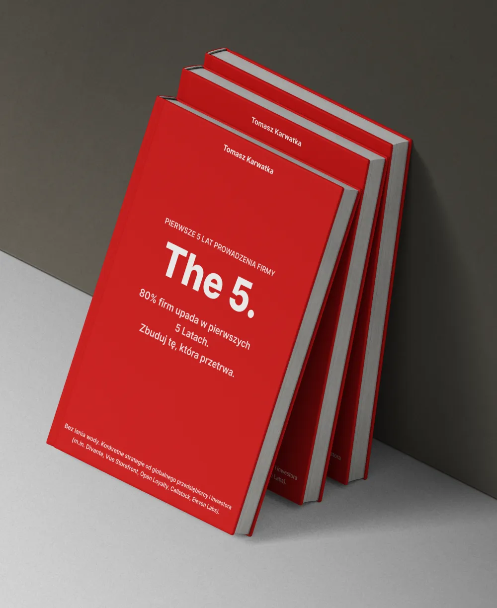 a pile of books in red covers with the title "The 5."