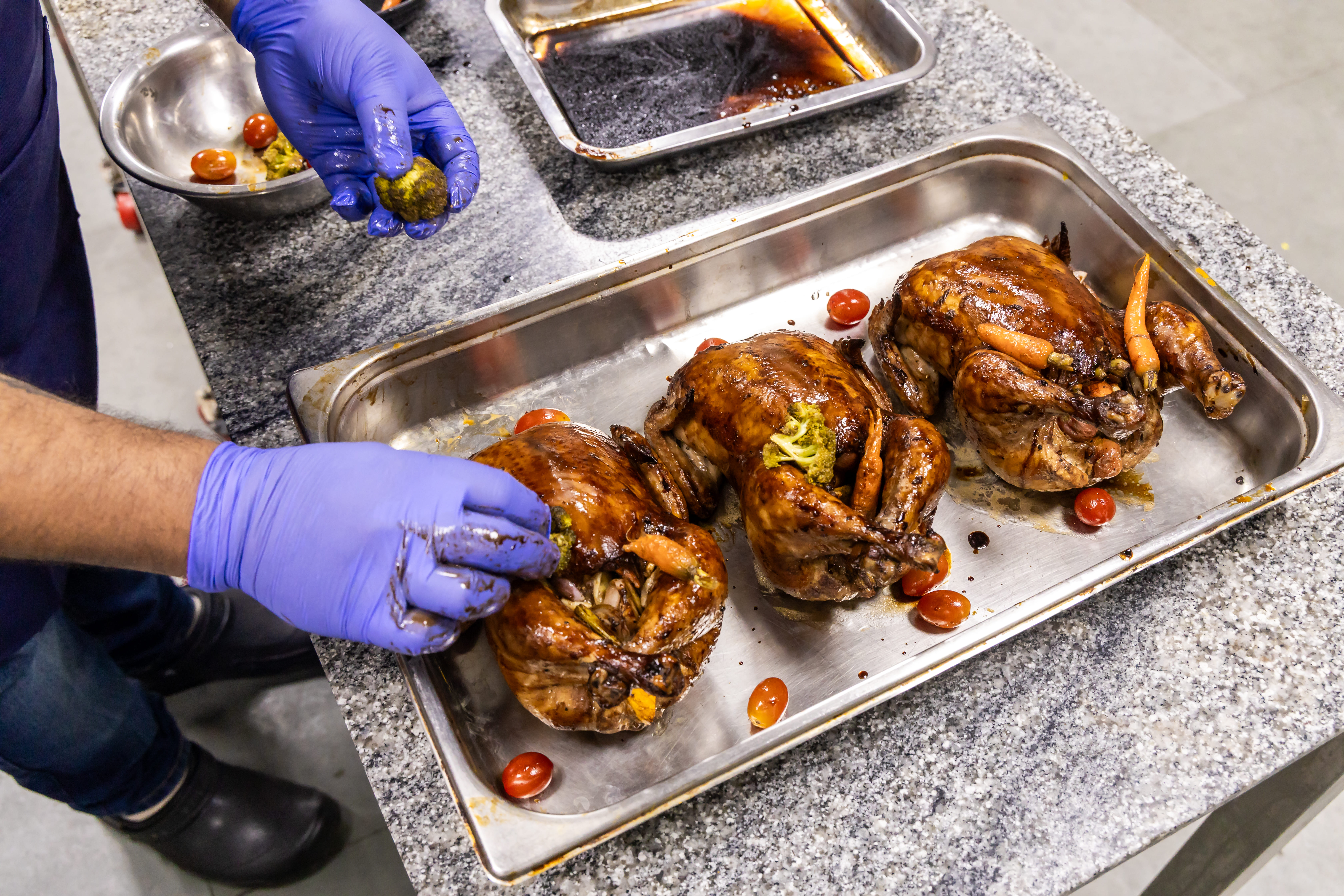 Stugged chicken basting under process  at the Central kitchen