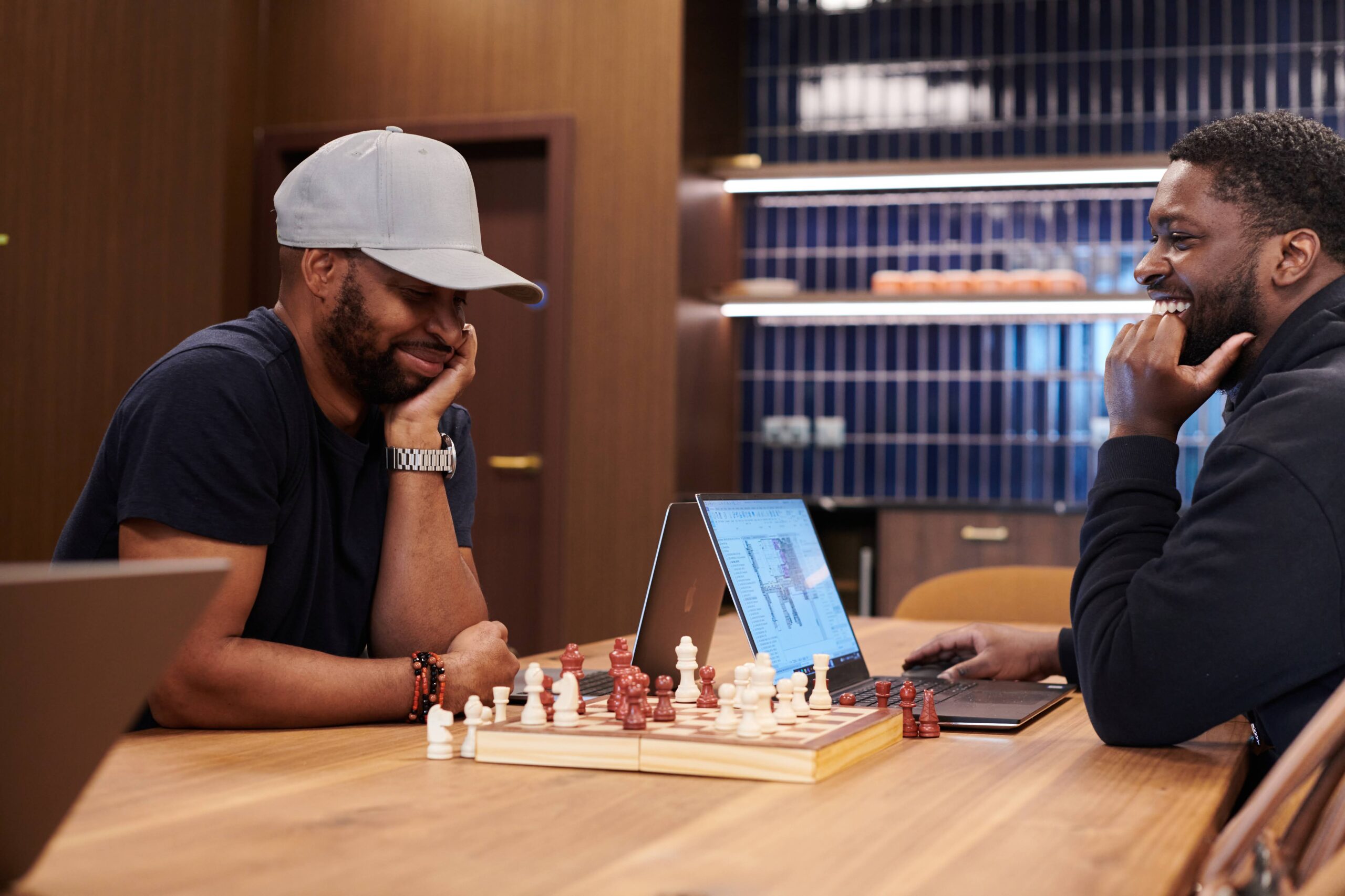 Two roommates playing chess at Synergy Madison in New York City