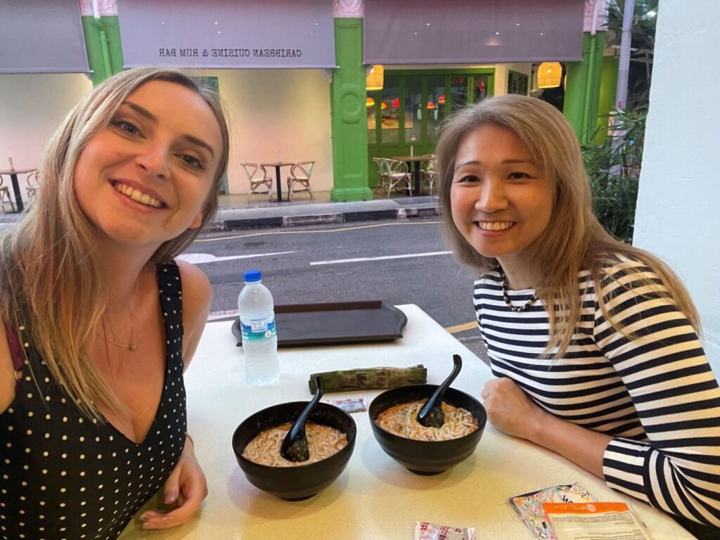 Michelle and Laura getting food in Singapore.