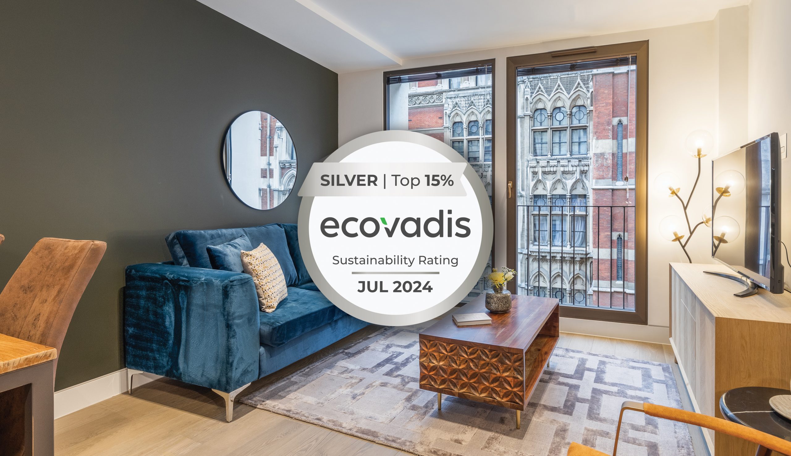 Modern living room with elegant decor, featuring an EcoVadis Silver sustainability badge.