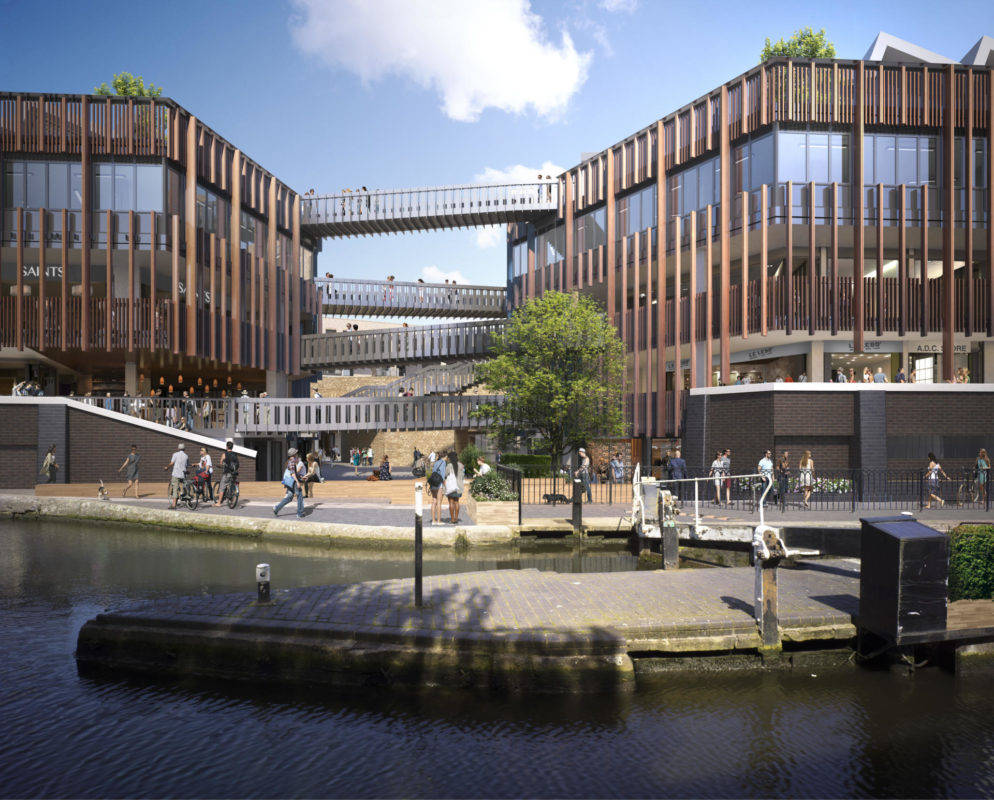 Modern canal-side building with wooden accents, glass facades, and pedestrian bridges.