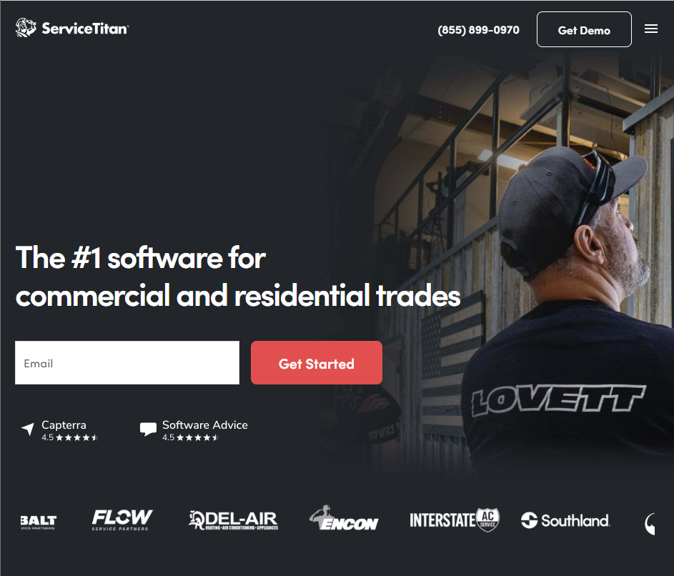 ServiceTitan homepage with the headline “The #1 software for commercial and residential trades,” an email field and “Get Started” button, ratings from Capterra and Software Advice, and a background image of a tradesperson on a jobsite.