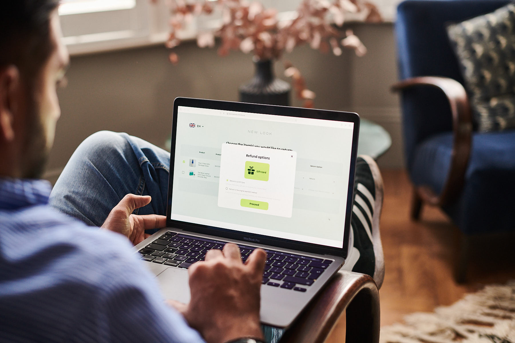A customer using an online portal to make a return