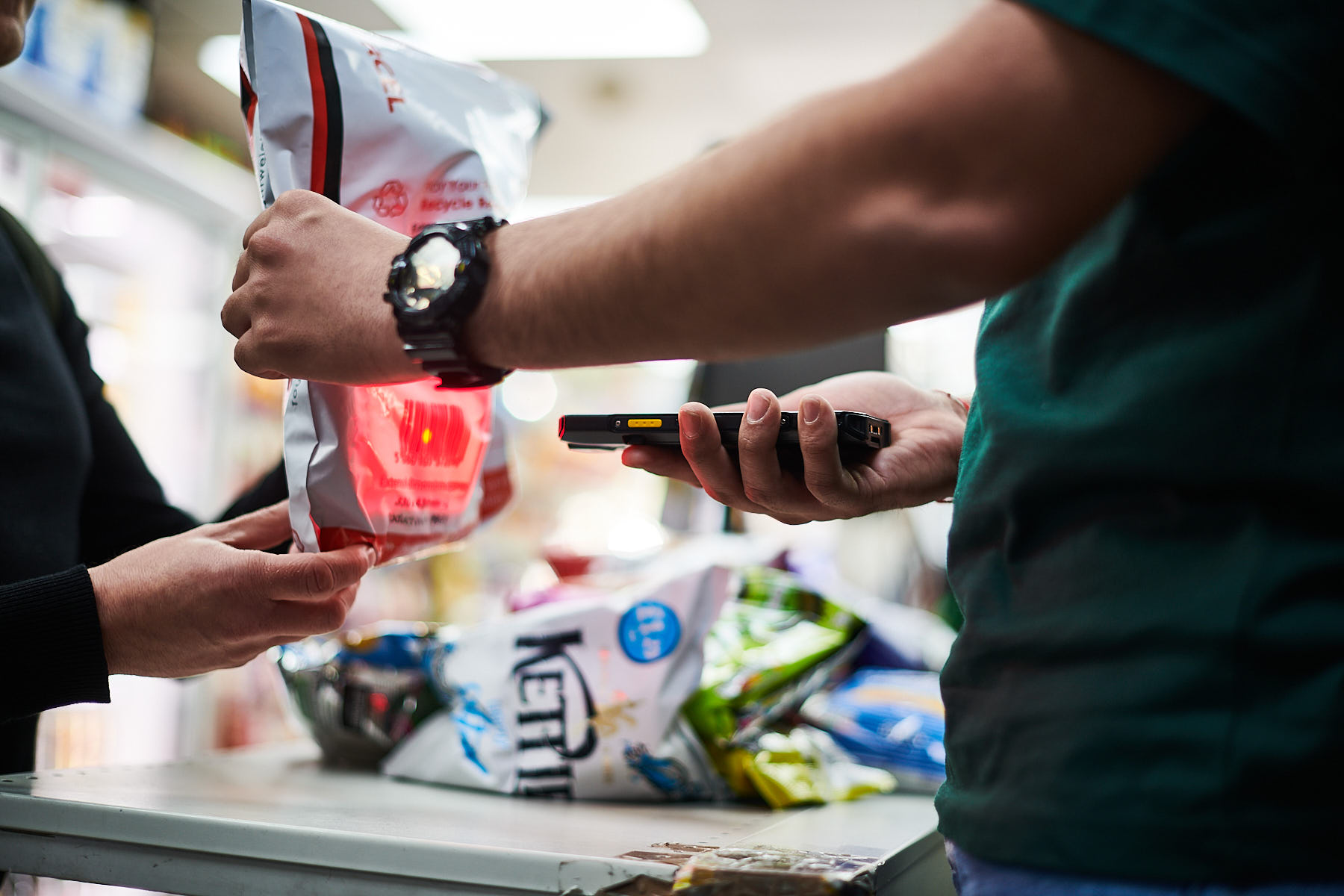 A man dropping off his return at a convenience store