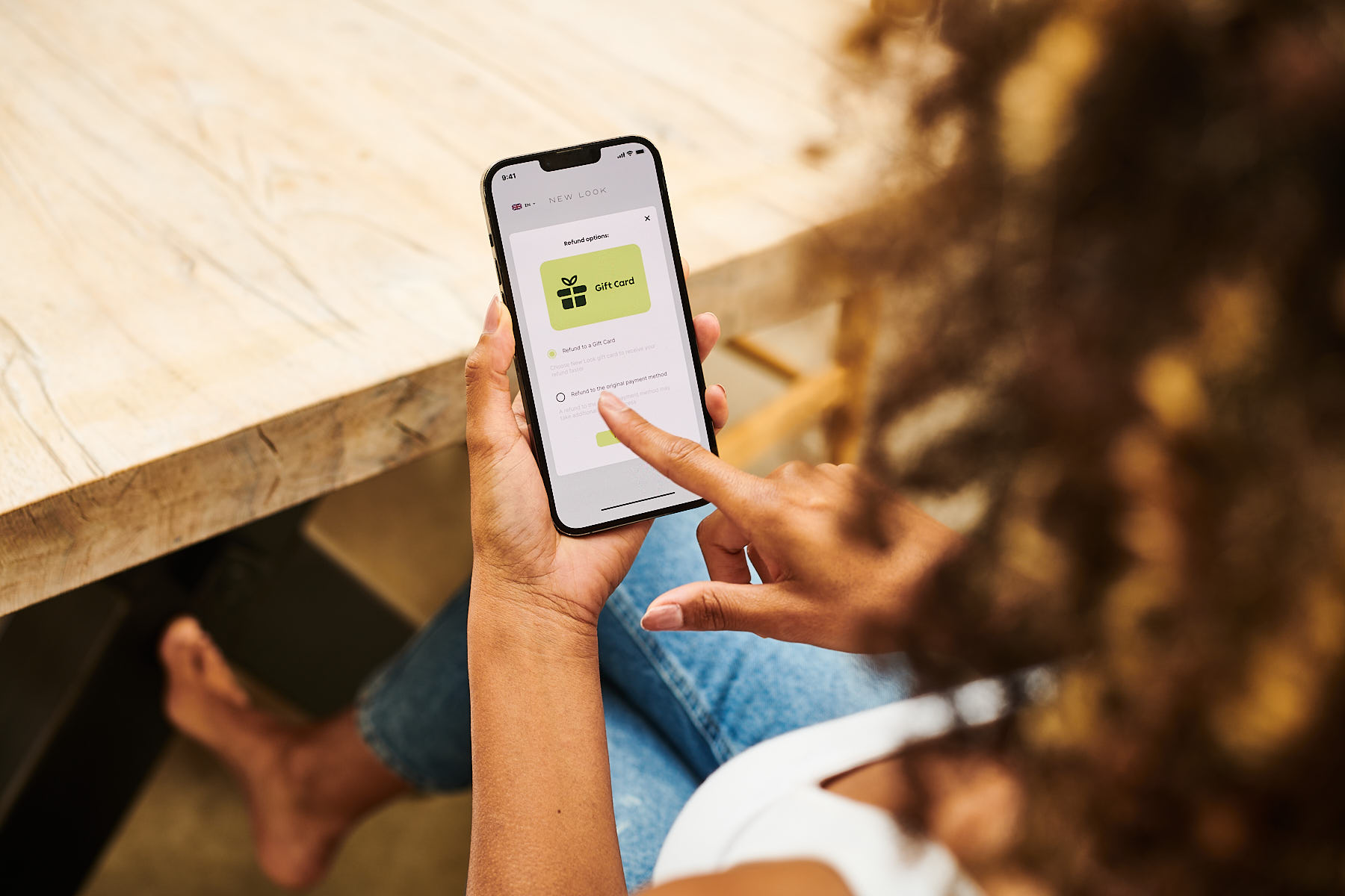 A customer using store credit as a refund