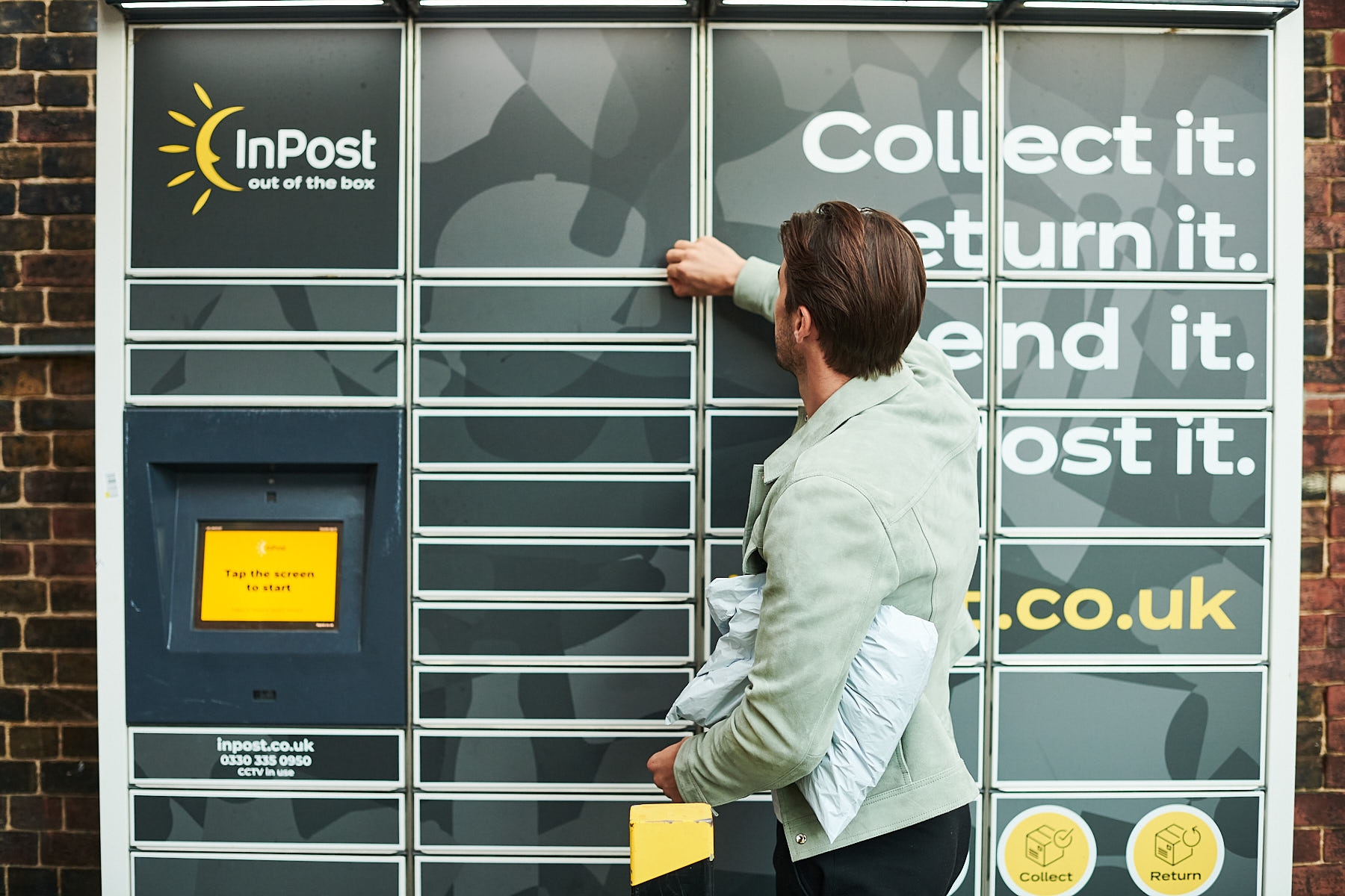A shopper dropping off their return at a locker