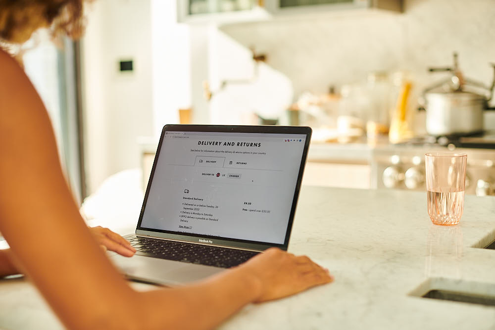 A customer checking the returns policy