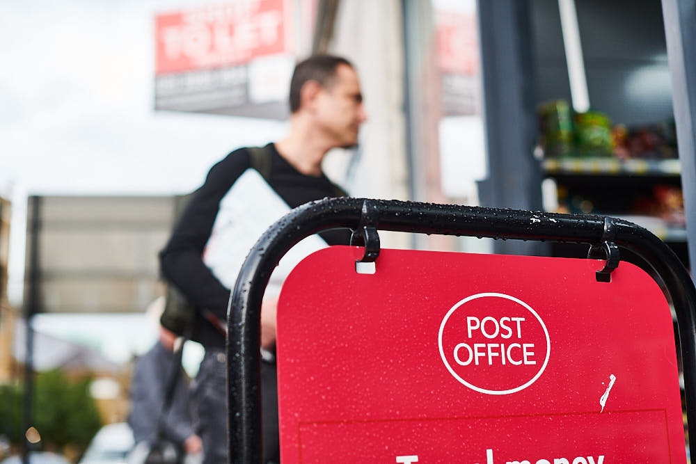 A customer heading to the post office