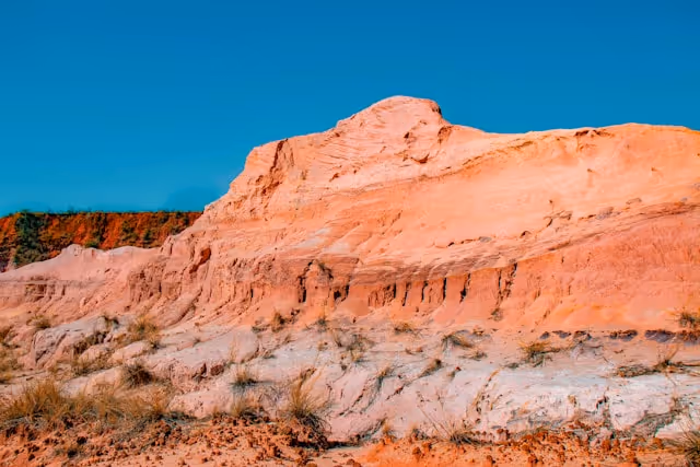 Red rocky mountain side.