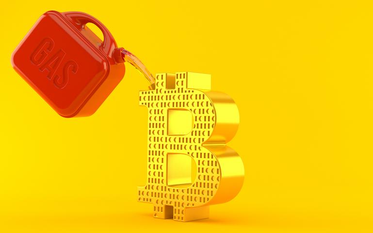 A conceptual image depicting a red gas can pouring fuel onto a golden Bitcoin symbol.